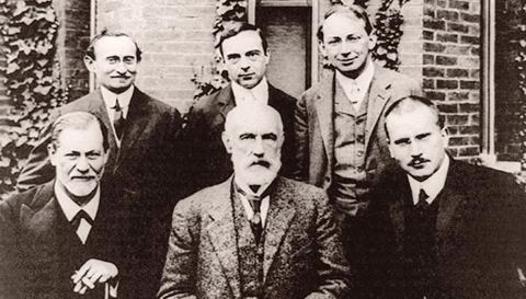 A group photograph, showing Sigmund Freud, Stanley Hall and Carl Jung